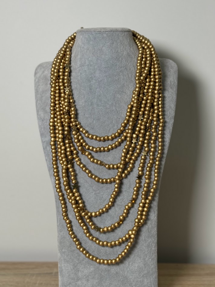 Collar estrellas doradas