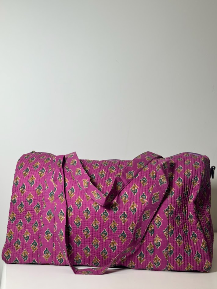 Bolsa de viaje rosa